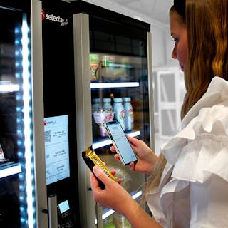 Pictured above is a Selecta vending machine equipped with contactless payment capabilities by Fiserv.