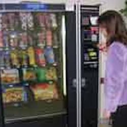 TV dinners in a frozen machine have heating instructions on the package. This machine is serviced by Automat Vending Inc., Yakima, Wash.