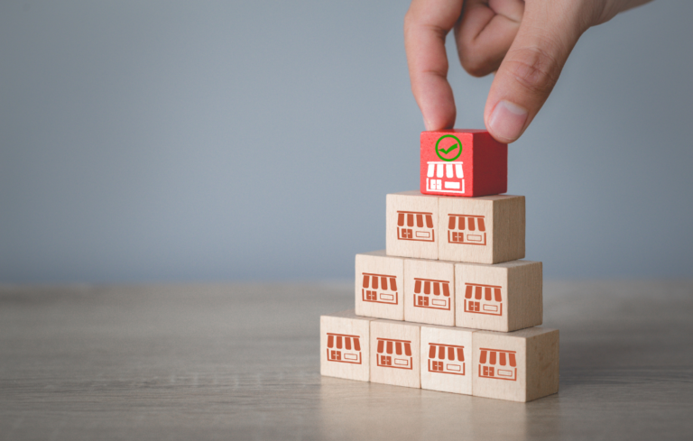 person stacking blocks